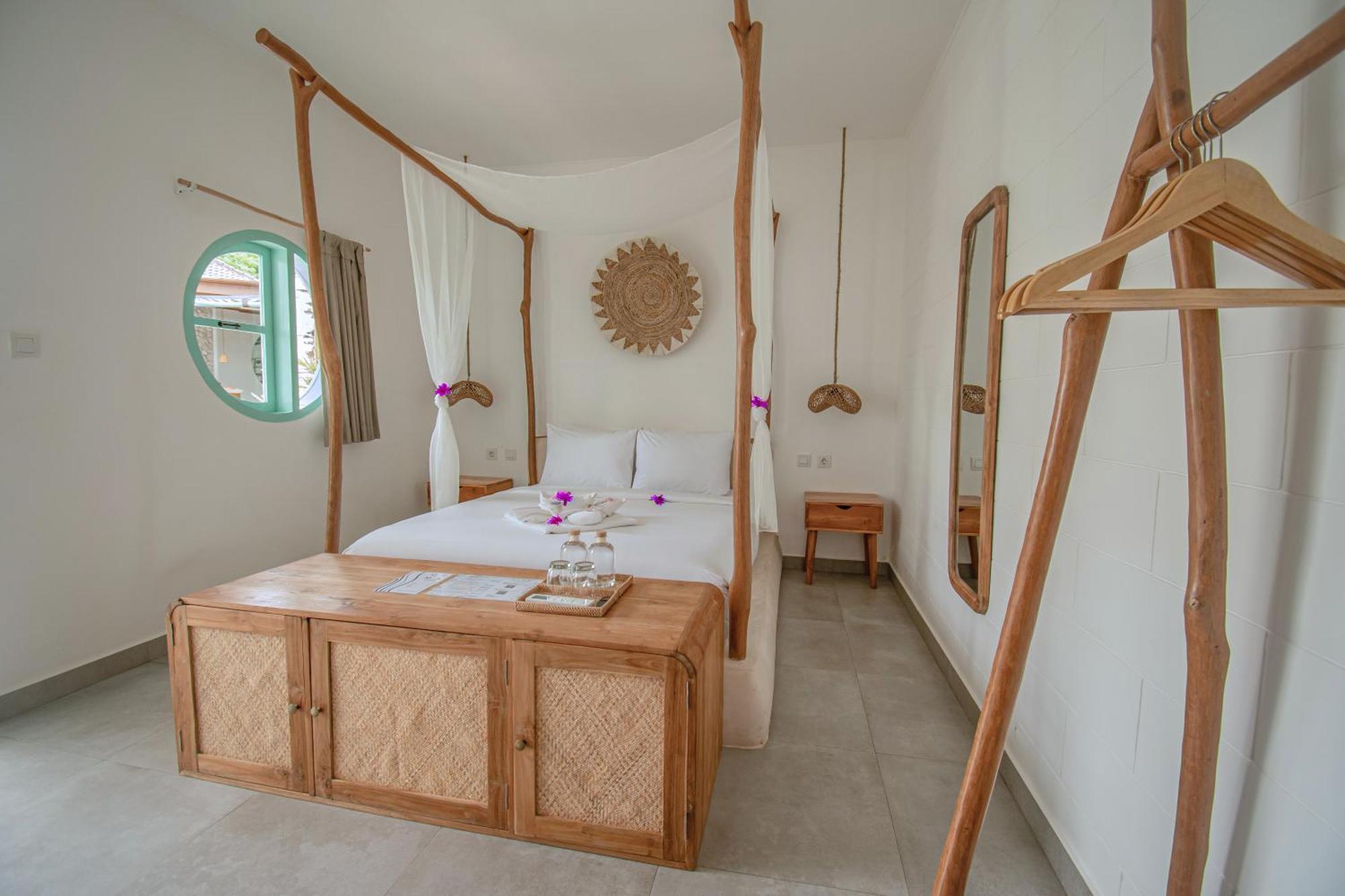 Quma Hotel Джили Трауанган Екстериор снимка